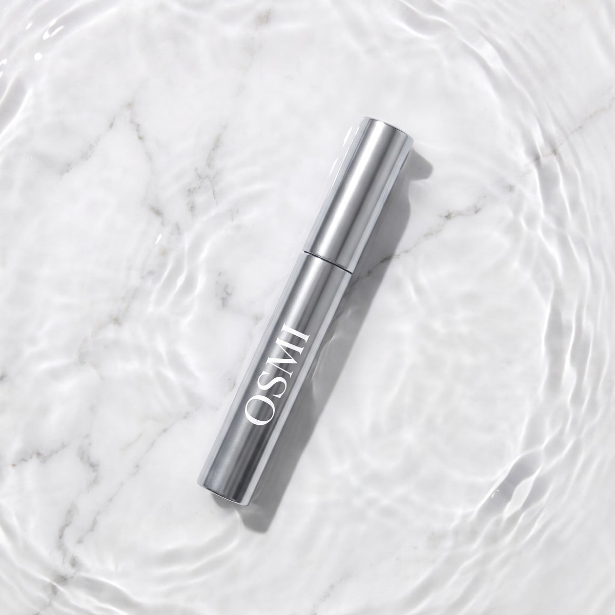 OSMI Lash Serum Silver on water