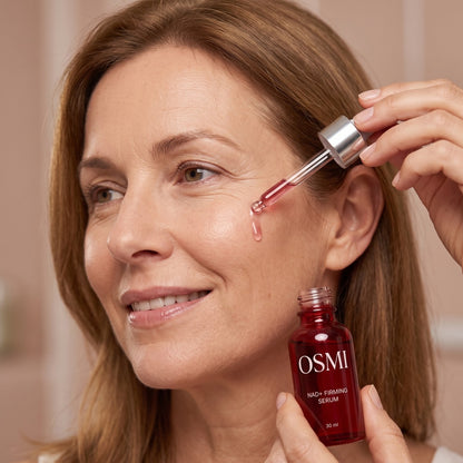 Applying OSMI NAD+ Firming Serum with the dropper