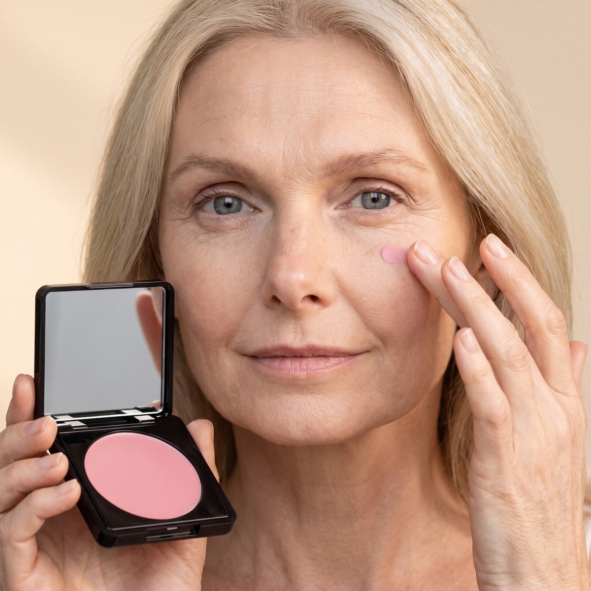 Tapping OSMI Under Eye Brightener under the eye